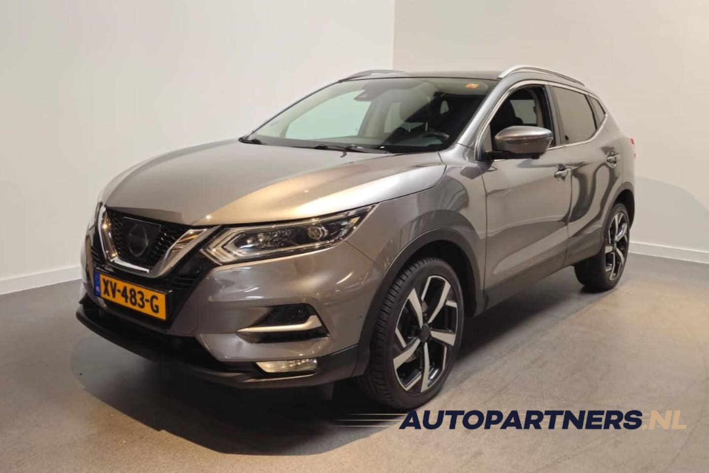 Nissan Qashqai - 1.2 Tekna + -  Stoelverwarming - Panoramadak - Bose Audio - 360 camera - Dodehoek detectie - AutoWereld.nl