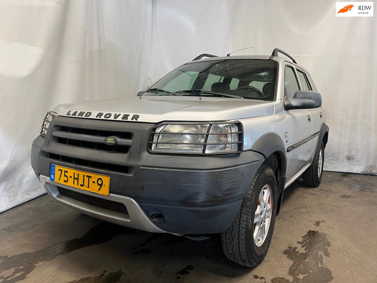 Land Rover Freelander Station Wagon - 1.8 E - Slechte Lak - Schade - AutoWereld.nl