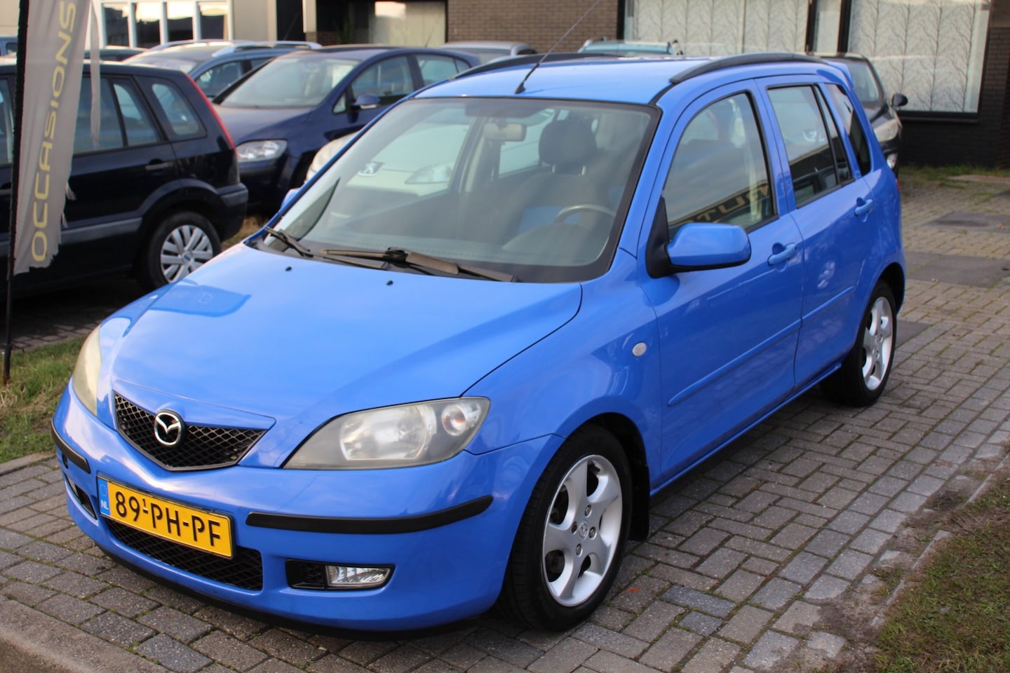 Mazda 2 - 1.6 Sportive Airco Uniek! LM-velgen Elec pakket Dakspoiler NAP APK - AutoWereld.nl