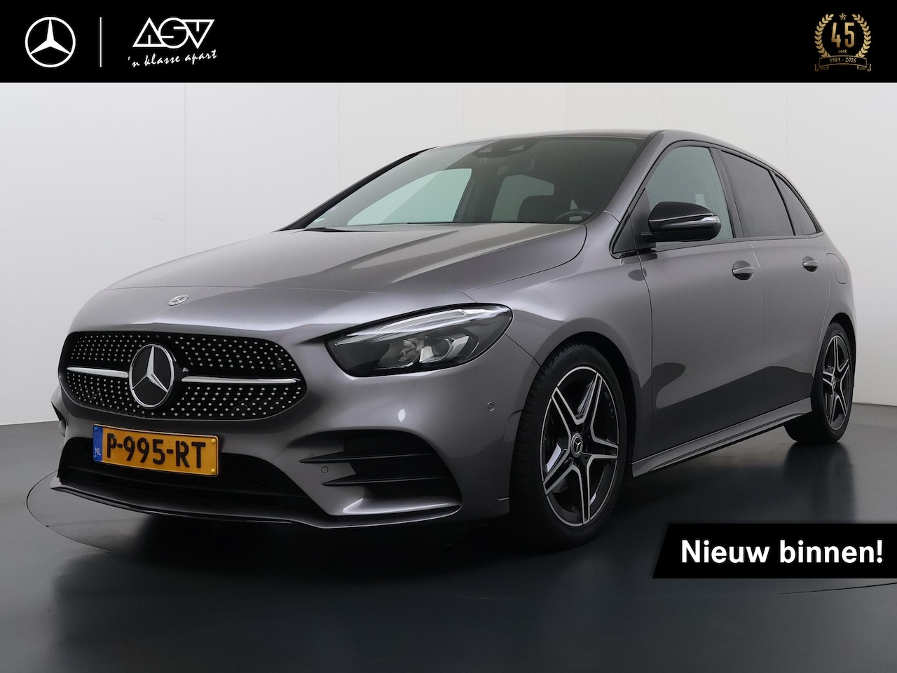 Mercedes-Benz B-klasse - 180 AMG Business Solution | Sfeerverlichting | Achteruitrij Camera | Parkeersensoren Voor - AutoWereld.nl