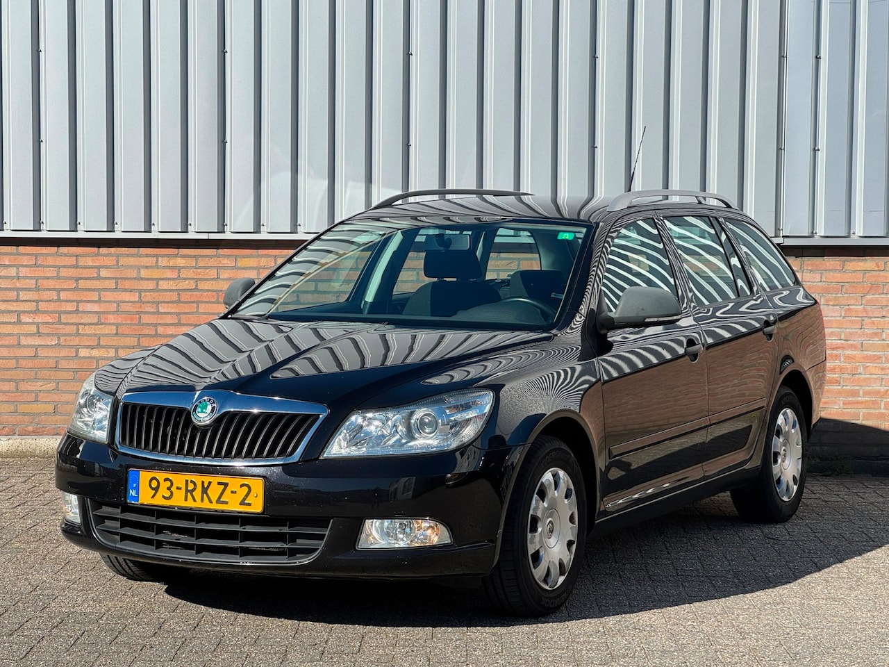 Skoda Octavia Combi - 1.2 TSI Comfort Airco/ Cruise - AutoWereld.nl