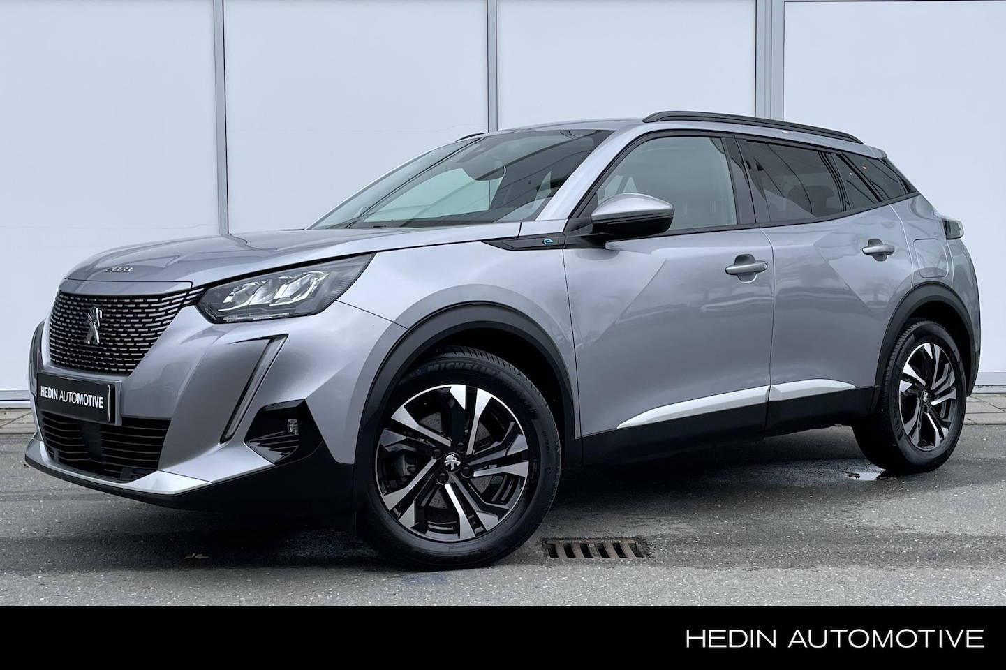 Peugeot e-2008 - EV Blue Lease Allure 50 kWh | Navigatie | Camera | Climate Control | Cruise control | Carp - AutoWereld.nl