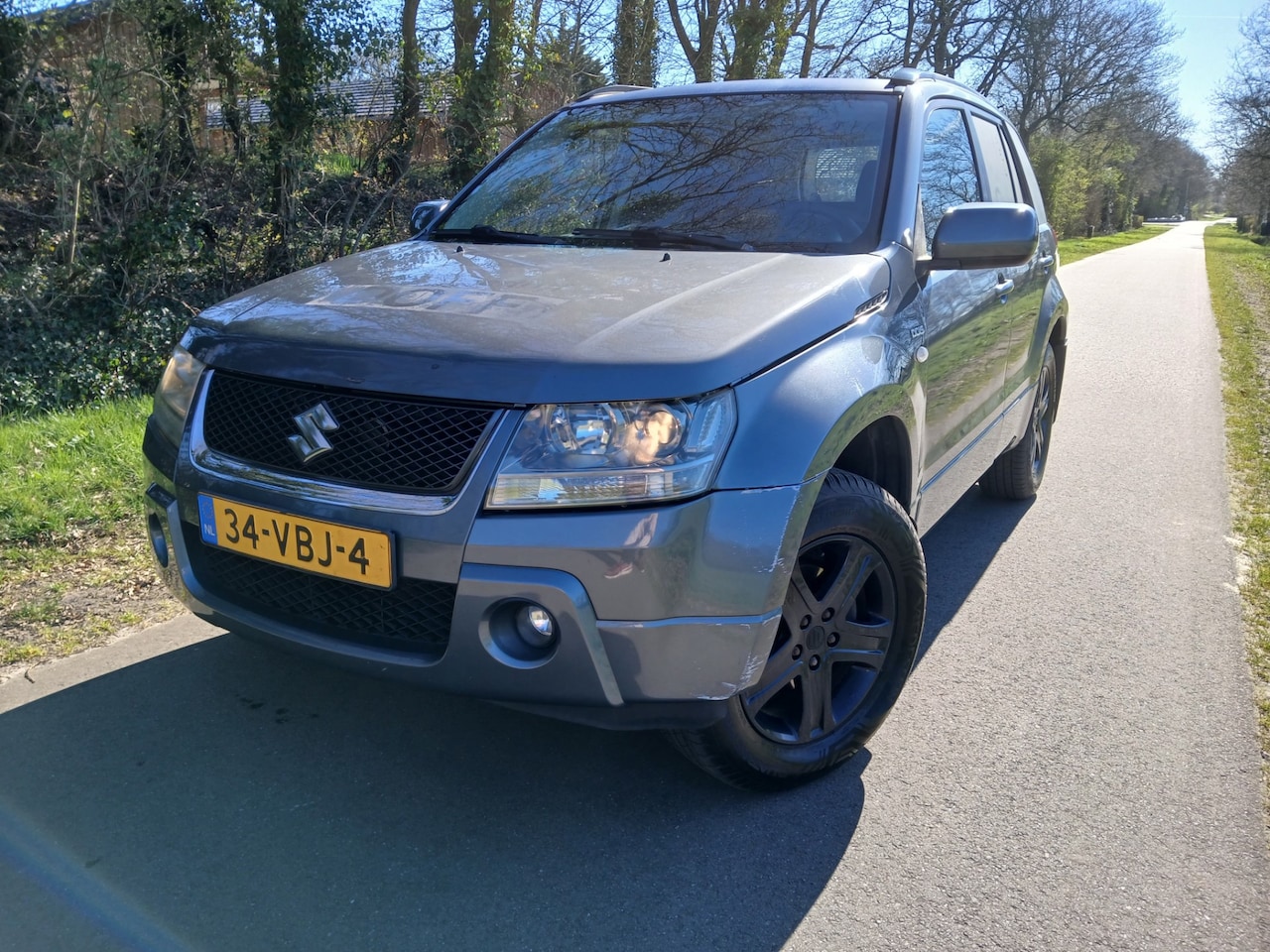 Suzuki Grand Vitara - 1.9 JLX |GRIJS KENTEKEN| - AutoWereld.nl
