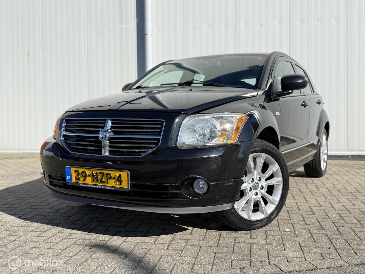 Dodge Caliber - 2.0 Sport Airco 1e eigenaar Cruise Stoel verw. - AutoWereld.nl