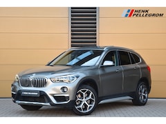 BMW X1 - sDrive20i Orange Edition II * Sportstoelen * Panoramadak * Head-up * Trekhaak