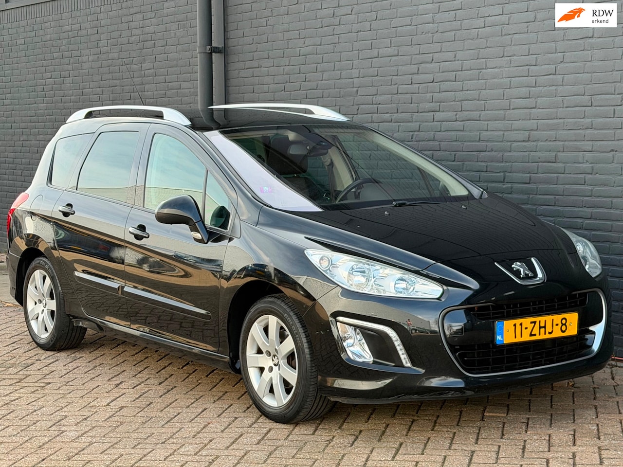Peugeot 308 SW - 1.6 VTi Active CLIMA CRUISE PDC PANO TREKHAAK - AutoWereld.nl