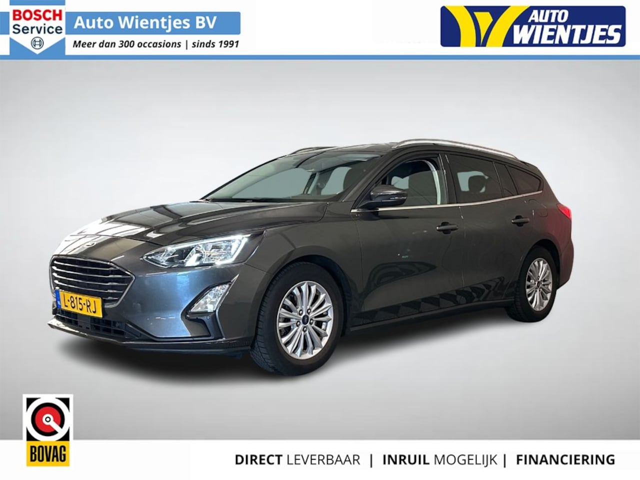 Ford Focus Wagon - 1.0 EcoB Hybrid | Titanium X Business | Navi | Camera | Trekhaak - AutoWereld.nl