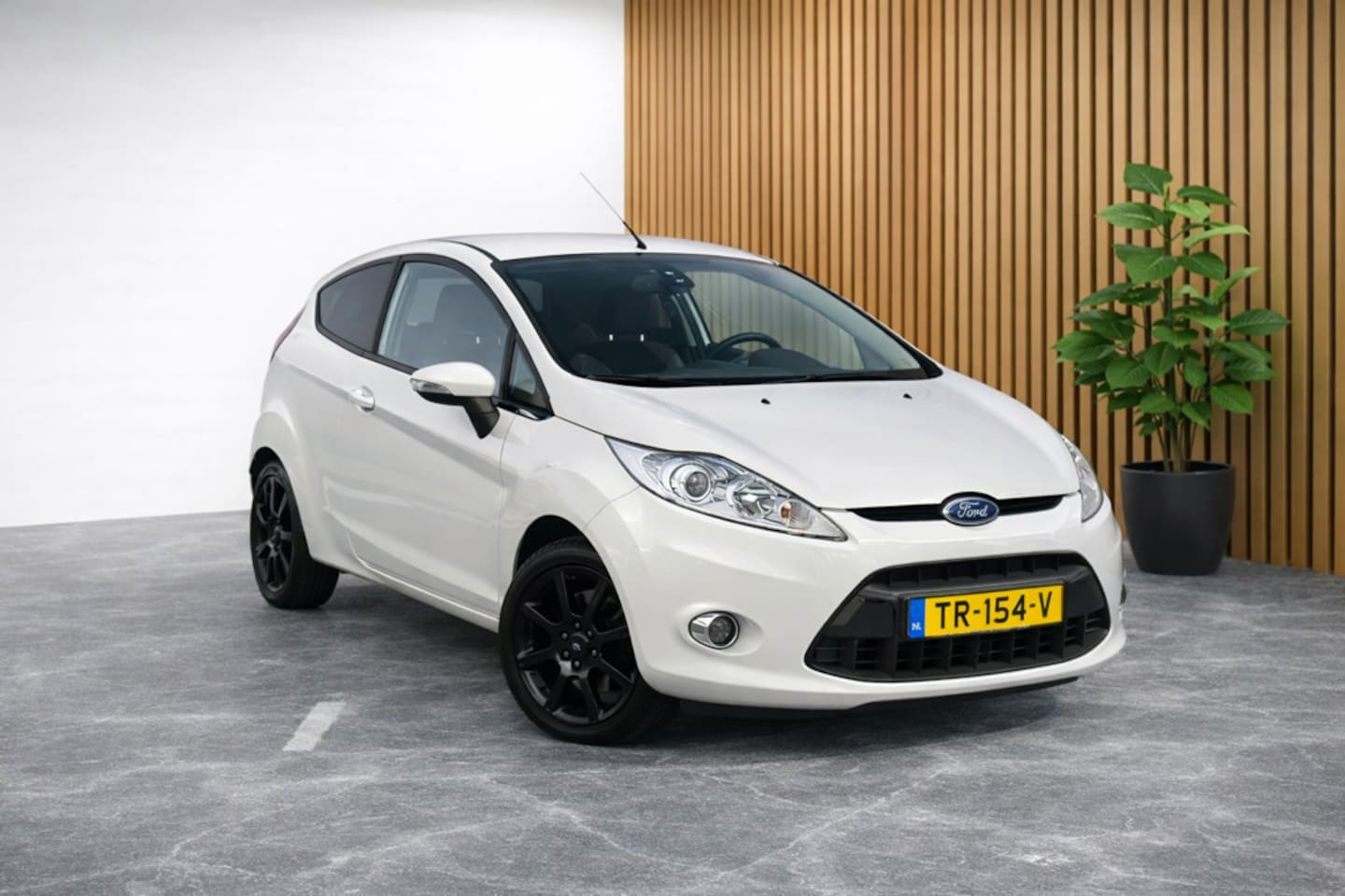 Ford Fiesta - 1.25 Ghia Sport (AIRCO, STOELVERWARMING, VOORRUIT VERWARMING, ELEKT RAMEN, NIEUWE APK, GOE - AutoWereld.nl