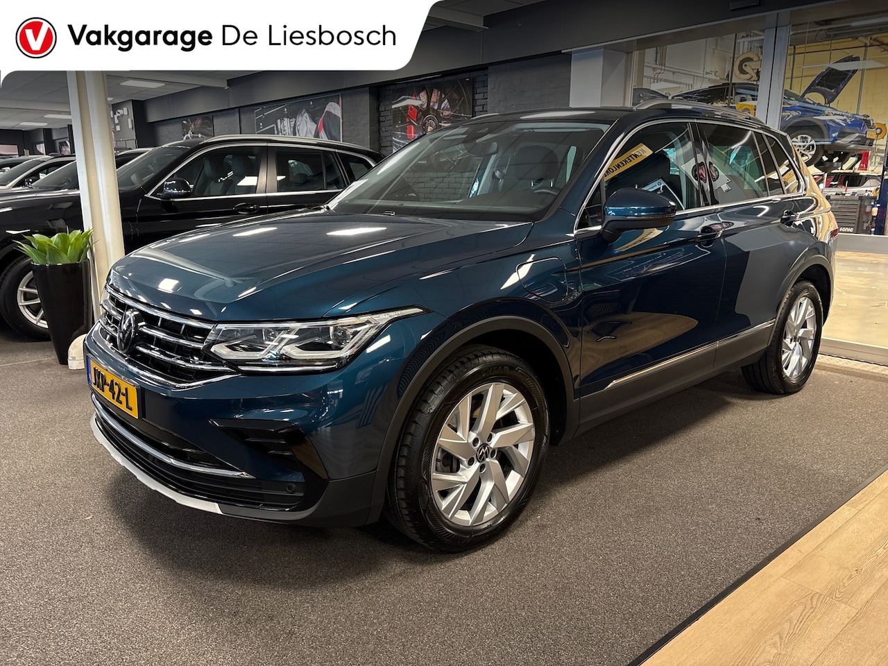 Volkswagen Tiguan - 1.4 TSI eHybrid,Business+,navi,camera,apple carplay,stoelverw.IQ light - AutoWereld.nl