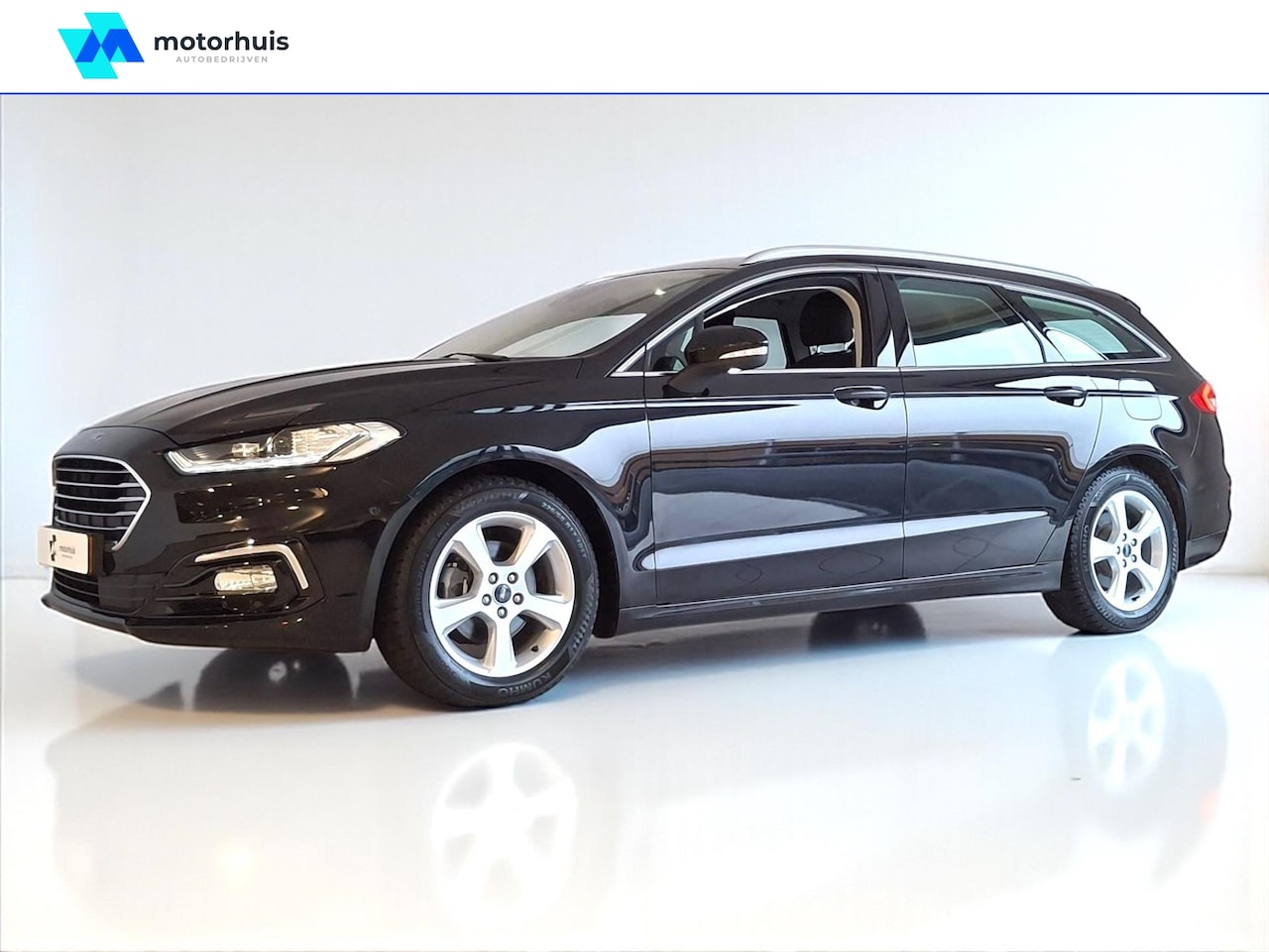 Ford Mondeo Wagon - 2.0 HEV 187pk Titanium AUTOMAAT NAVI LED CAMERA WINTERPACK - AutoWereld.nl