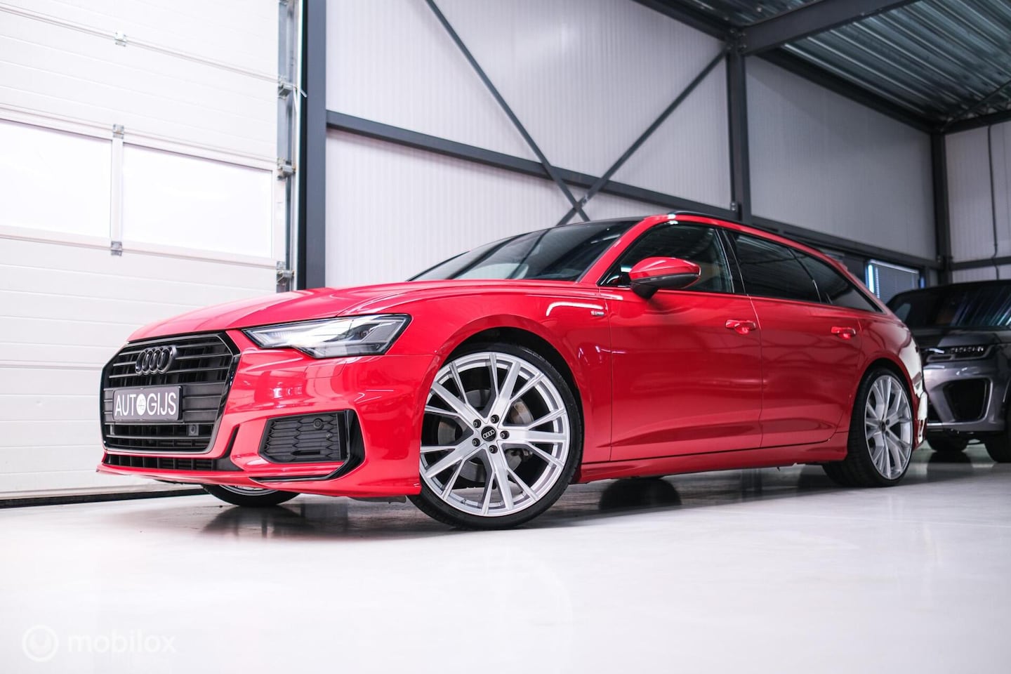 Audi A6 Avant - 45 TFSI S edition 265 pk | Tango Rood | S6 look | NL auto NAP | Panoramadak | 21 inch | S - AutoWereld.nl