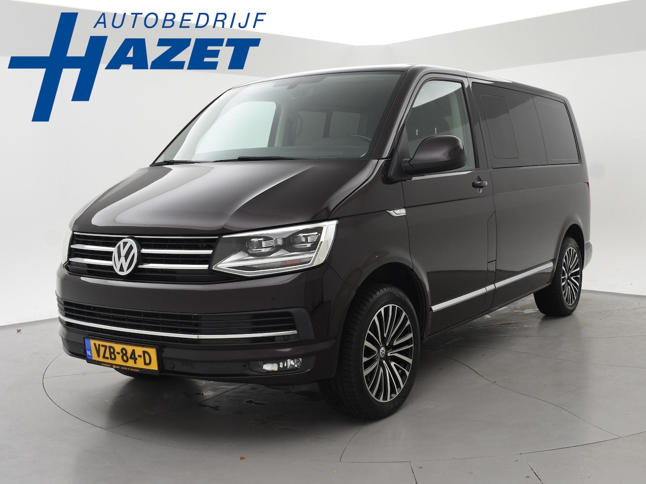 Volkswagen Transporter Caravelle - 2.0 TDI DSG ROLSTOEL LIFT EURO 6 + STANDKACHEL | 18 INCH | CAMERA | CARPLAY | LED | STOELV - AutoWereld.nl