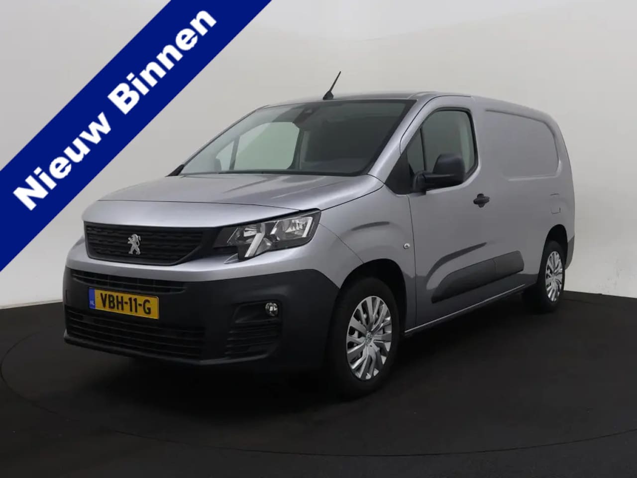 Peugeot Partner - 1.5 BlueHDI Premium Long | PDC | Trekhaak | Navi | Airco |  07-2019 45.872 KM - AutoWereld.nl