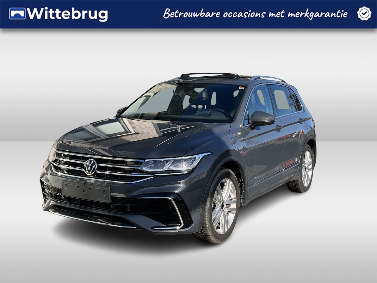 Volkswagen Tiguan - 1.4 TSI eHybrid R-Line / AUTOMAAT/ LEER/ PANO/ DCC/ APP-CONNECT/ PARK.SENSOR+360 CAMERA/ M - AutoWereld.nl