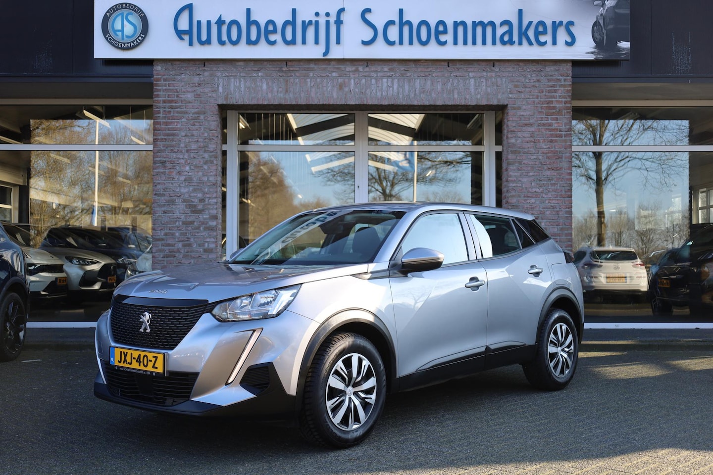 Peugeot 2008 - 1.2 PureTech Active CARPLAY STOELVERW. 360-CAMERA DAB CRUISE NAVI VOICE PDC - AutoWereld.nl