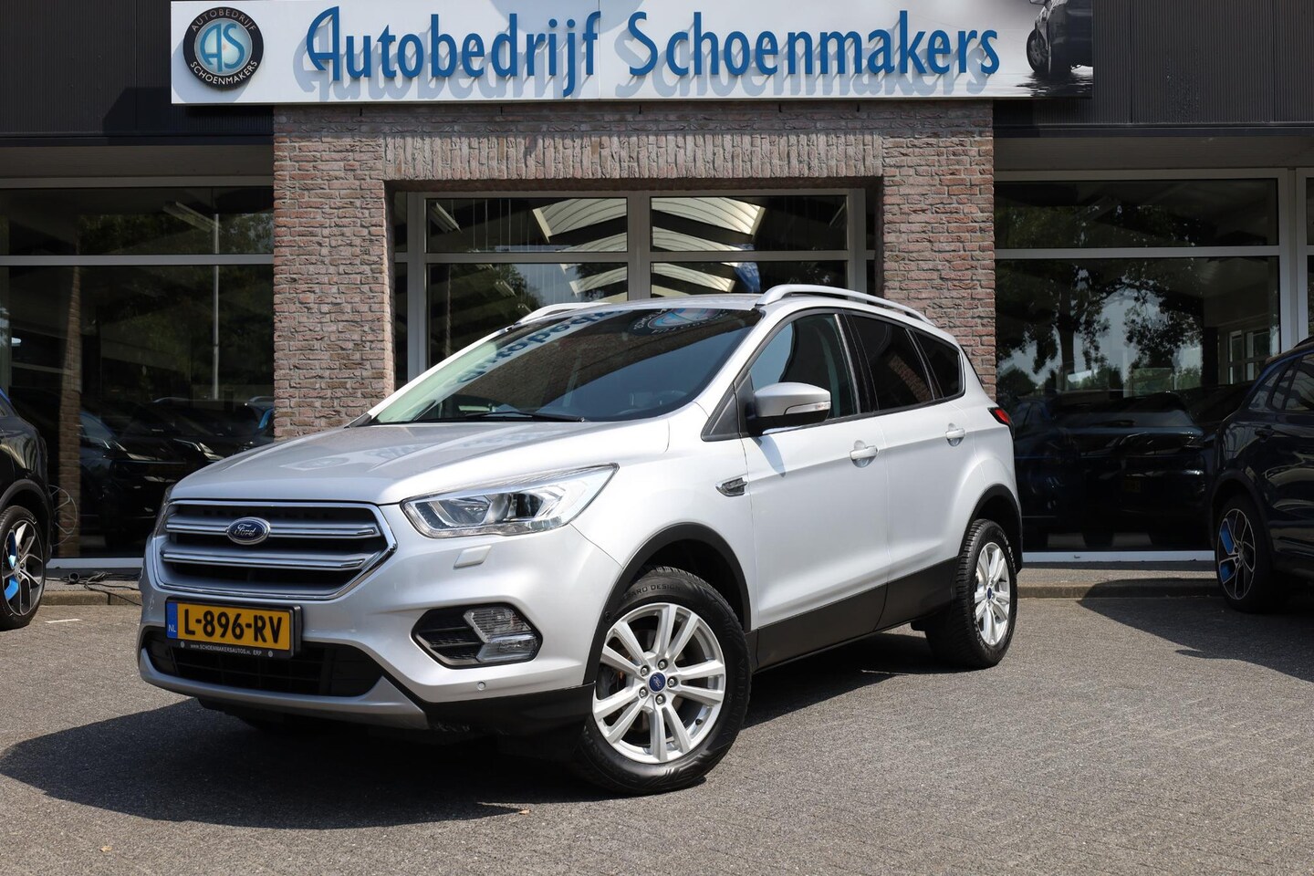 Ford Kuga - 1.5 EcoBoost Titanium TREKHAAK-ELEC STUUR/RUIT/STOELVERWARMING CARPLAY 2xPDC NAVI CRUISE 1 - AutoWereld.nl