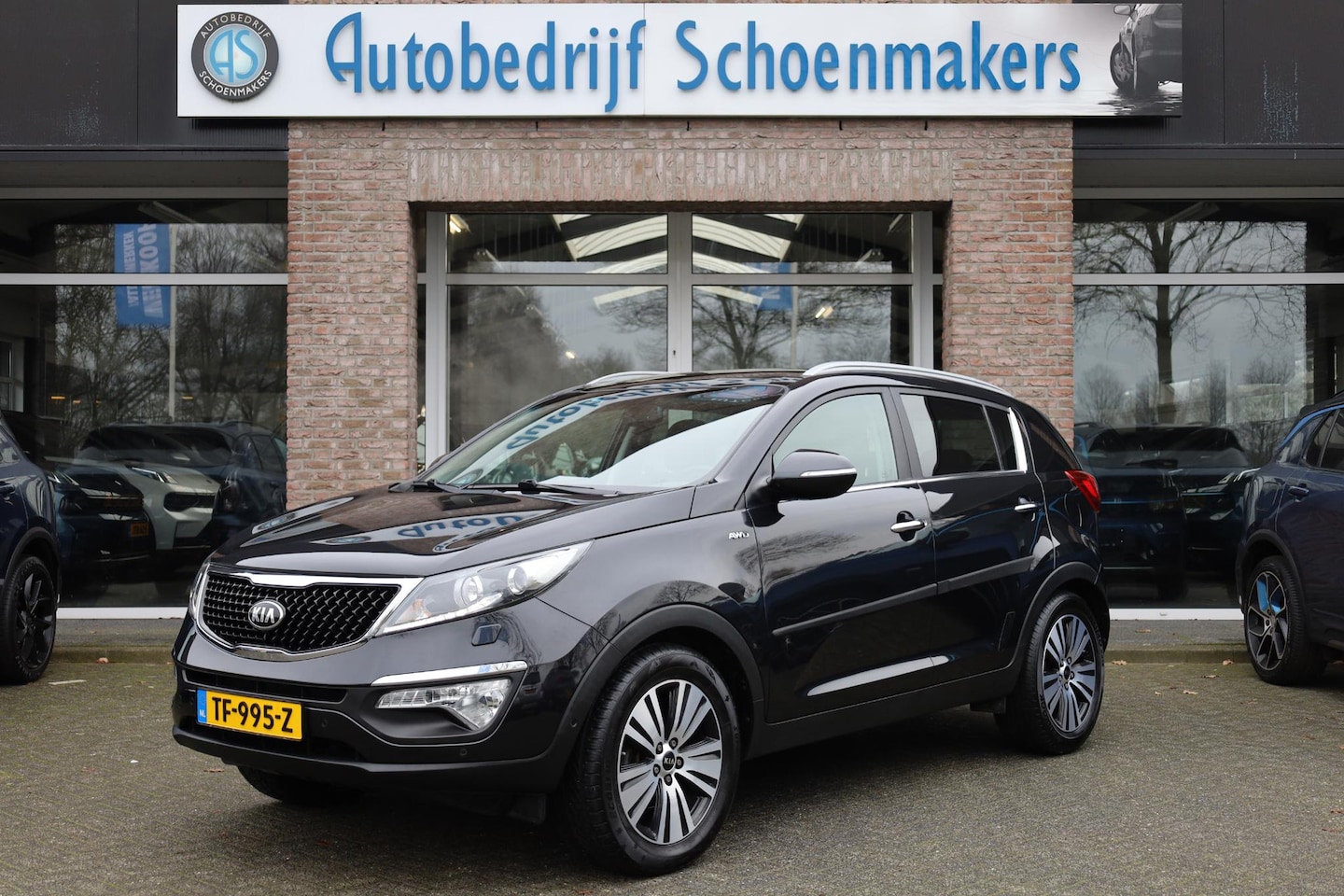 Kia Sportage - 2.0 ExecutiveLine 4WD TREKHAAK PANO CAMERA 4XSTOELVERW. HALF-LEER CLIMA NAVI CRUISE 2XPDC - AutoWereld.nl