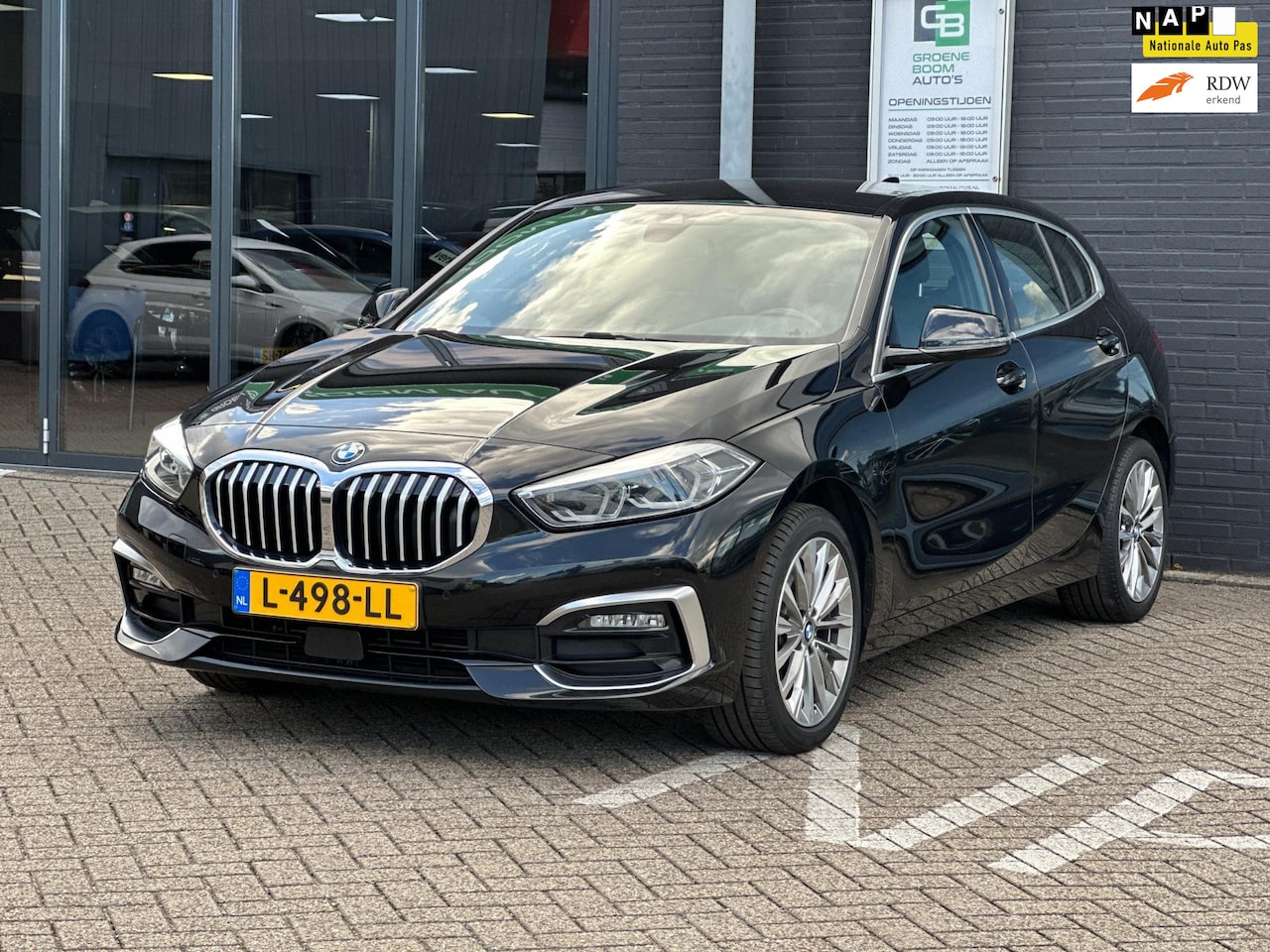BMW 1-serie - 118i Business Edition Plus/SFEERVERLICHTING/NAVI/NL-AUTO NAP!! - AutoWereld.nl