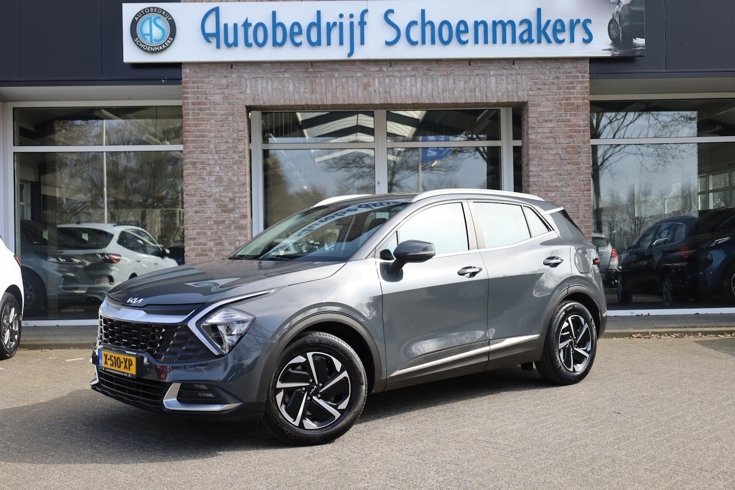 Kia Sportage - 1.6 T-GDi MHEV DynamicLine TREKHAAK CAMERA NAVI DAB CARPLAY CRUISE 2xPDC CLIMA 17"LMV - AutoWereld.nl