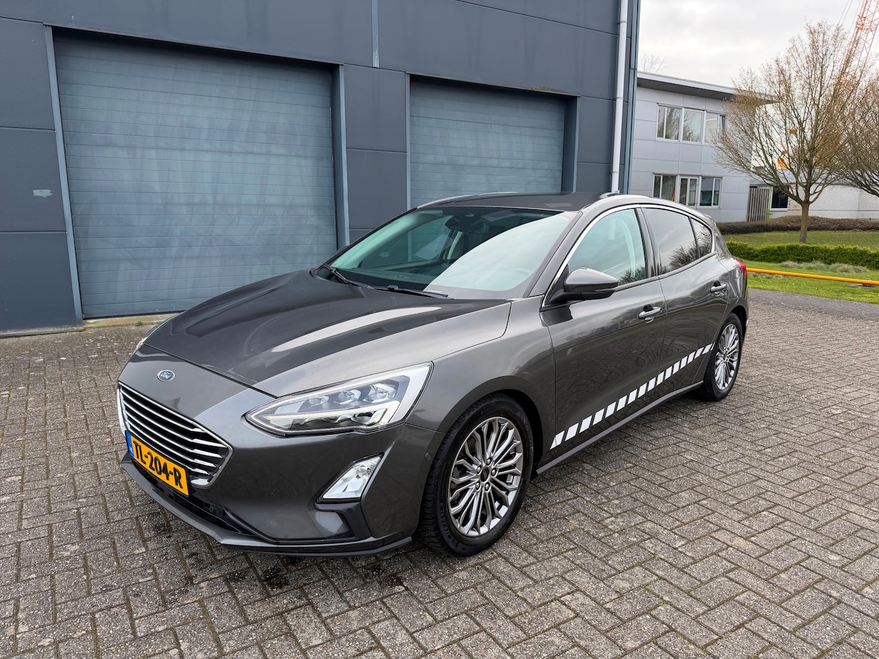 Ford Focus - 1.0 EcoBoost Titanium Business 2018 - AutoWereld.nl