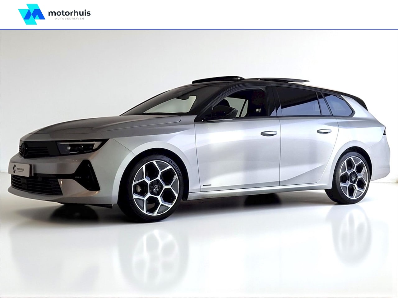 Opel Astra Sports Tourer - 1.2 Turbo 130pk Start/Stop Ultimate AUTOMAAT HUD LED CAMERA WINTERPACK - AutoWereld.nl