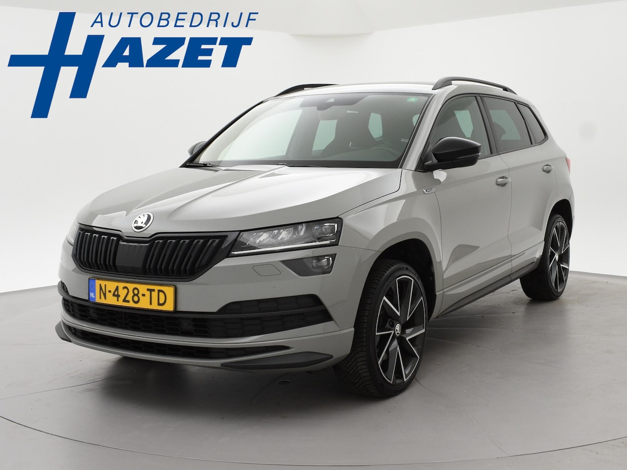 Skoda Karoq - 1.5 TSI ACT 150 PK DSG SPORTLINE + CANTON AUDIO | STEEL GREY | CAMERA | 19 INCH | VIRTUAL - AutoWereld.nl