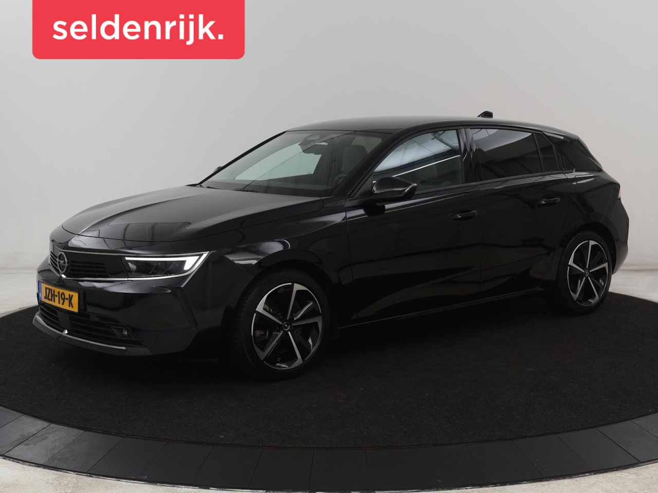 Opel Astra - 1.6 Hybrid Business Edition | Stoelverwarming | Adaptive cruise | Camera | Stuurverwarming - AutoWereld.nl
