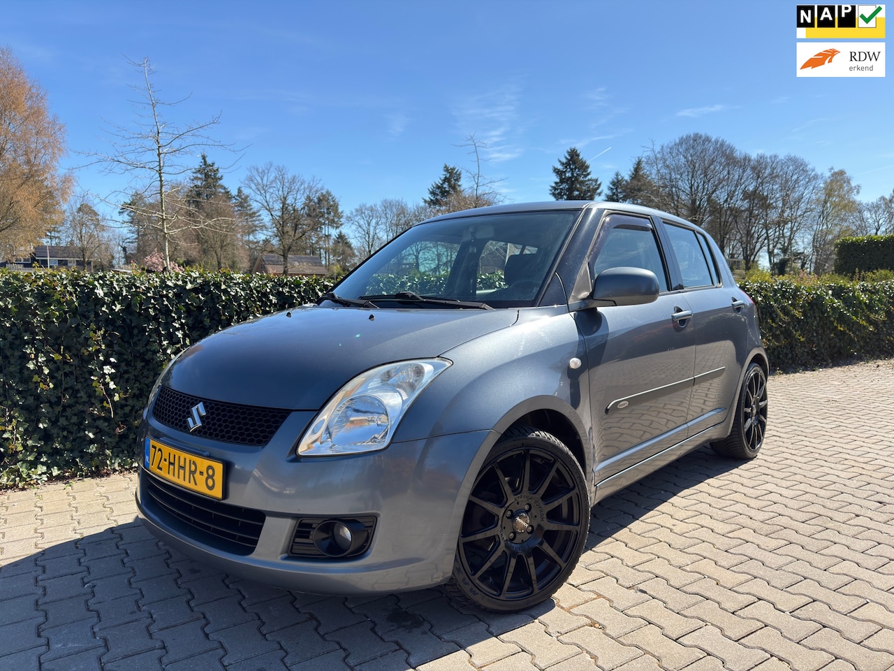 Suzuki Swift - 1.3 Shogun 5- Deurs , Airco / Elec.Pakket / Isofix / 17" Lm Velgen. - AutoWereld.nl