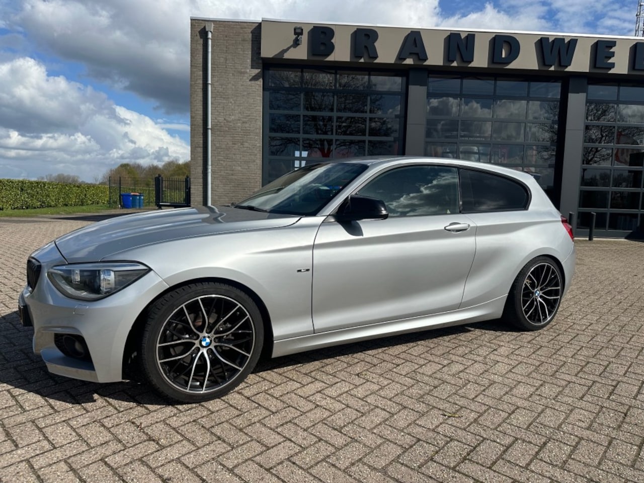 BMW 1-serie - 118D HIGH EXECUTIVE aut leder M look - AutoWereld.nl