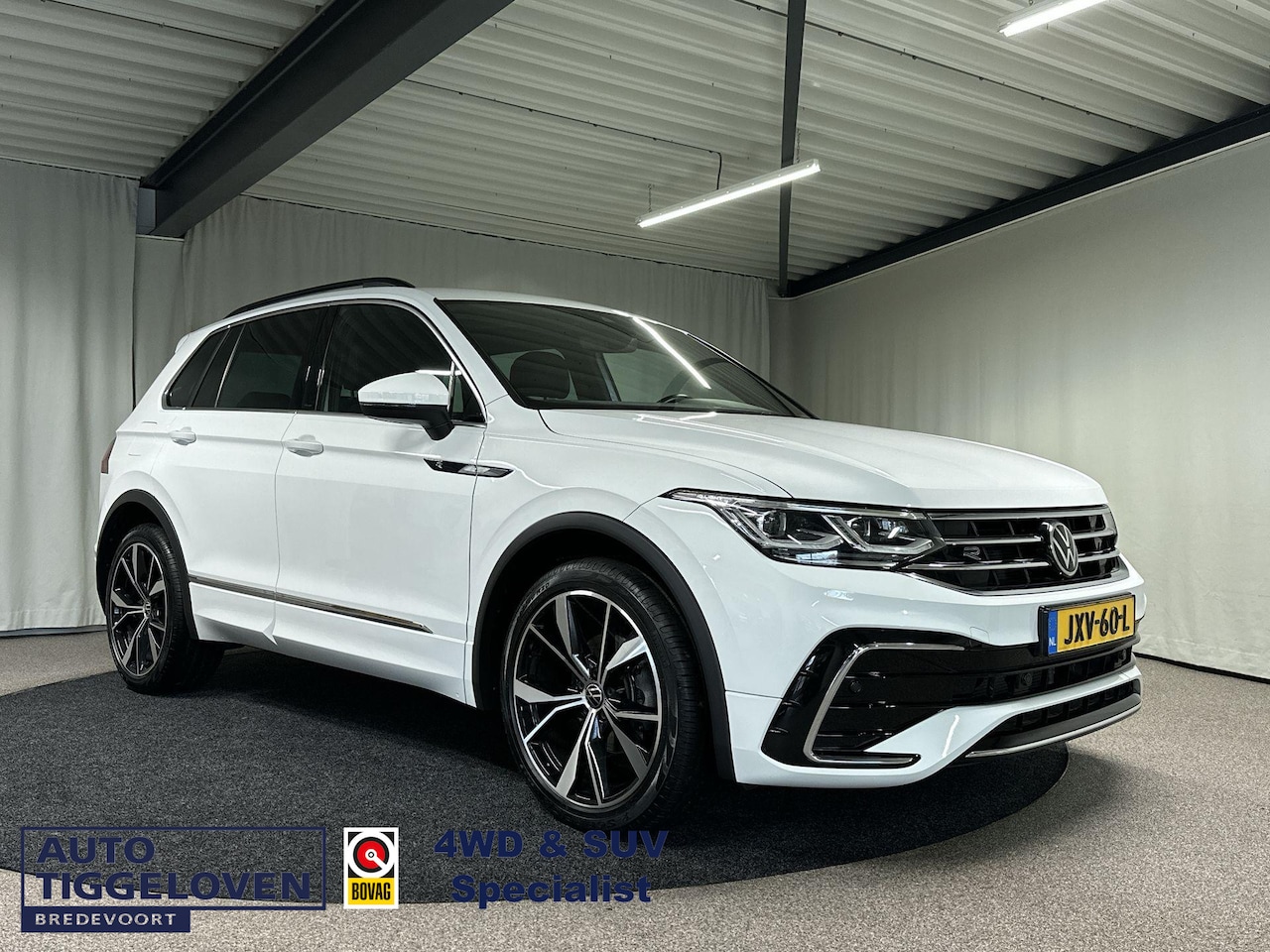 Volkswagen Tiguan - 1.5 TSI R-Line Business+ Automaat | Trekhaak | IQ Light - AutoWereld.nl