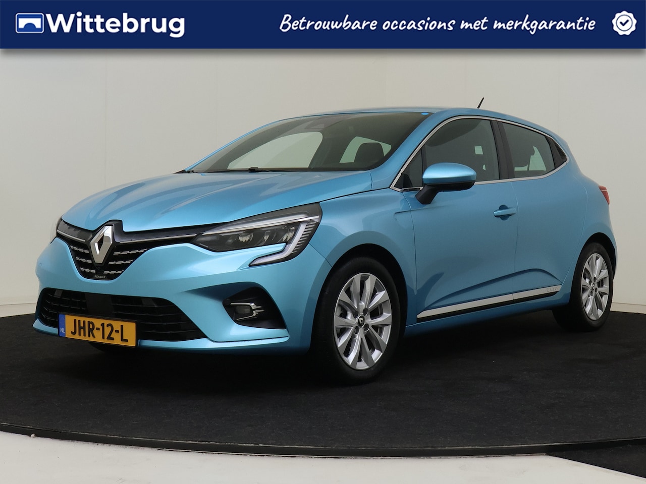 Renault Clio - 1.6 E-Tech Hybrid 140 Intens | Camera | Navigatie | Climate Control - AutoWereld.nl