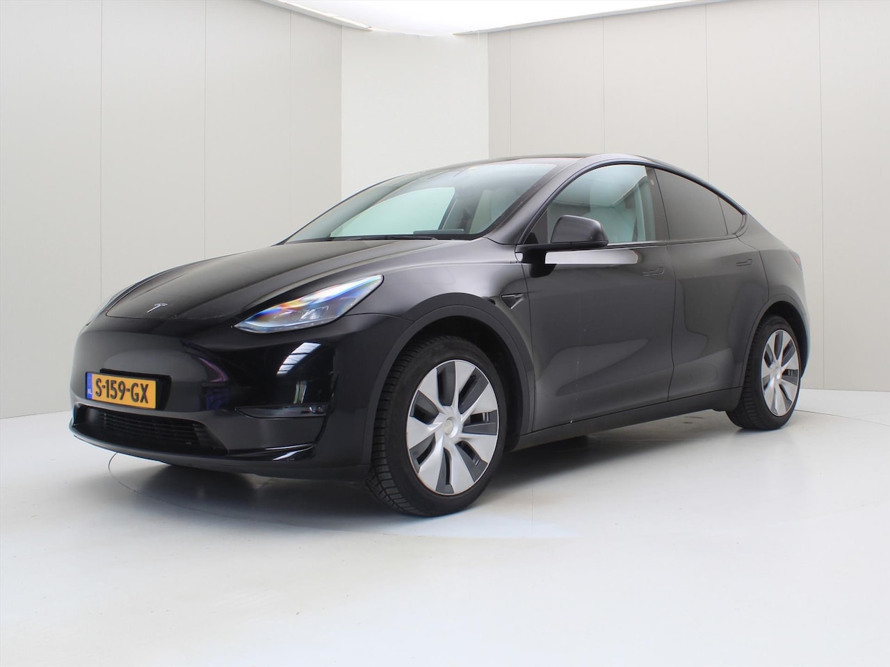 Tesla Model Y - Long-Range AWD 351pk 75 kWh 93.7% SoH [ WIT LEDER+AUTOPILOT+TREKHAAK+19 INCH+PREMIUM AUDIO - AutoWereld.nl