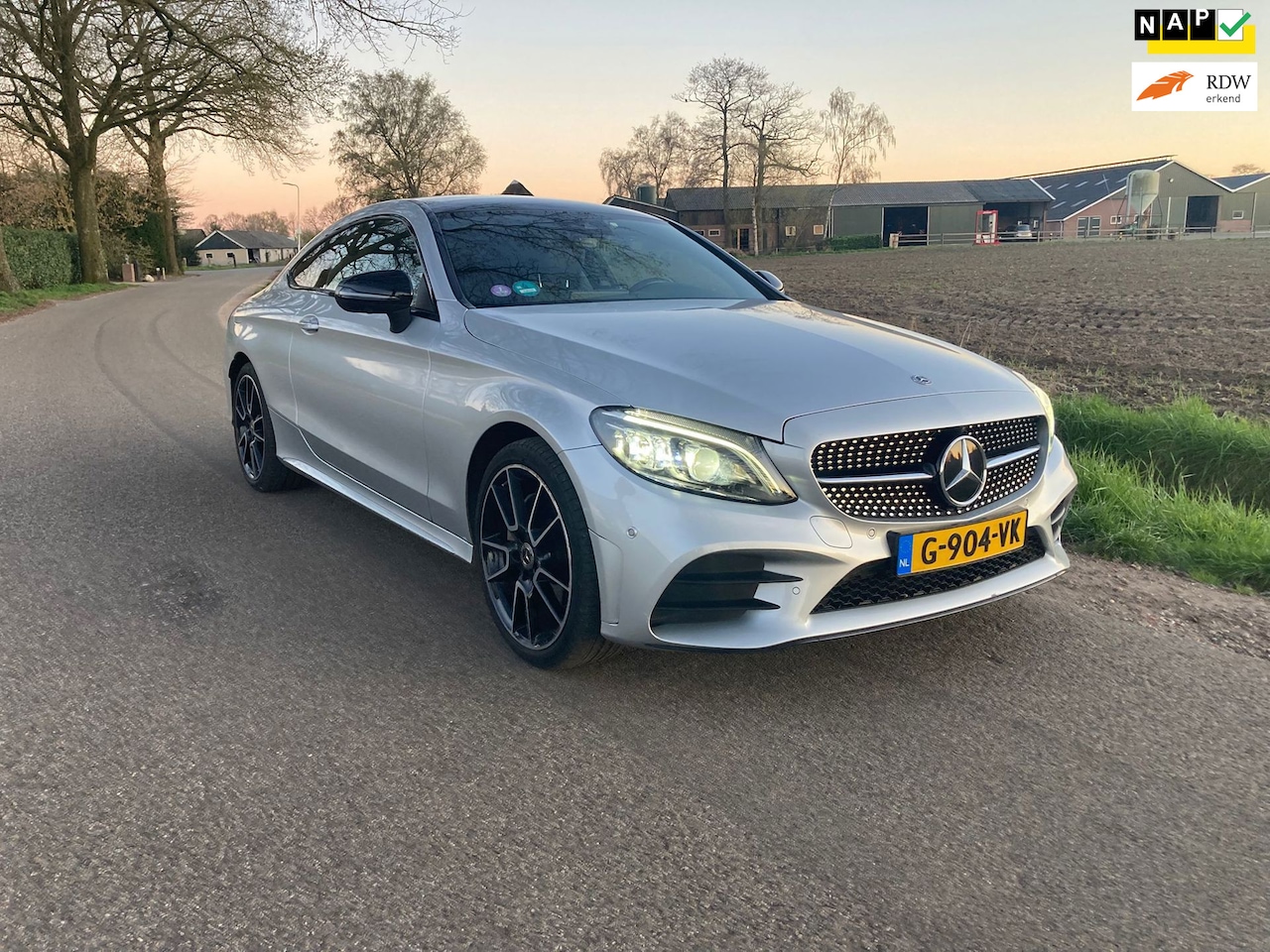 Mercedes-Benz C-klasse Coupé - 180 Premium Plus Pack 1e eig Panodak AMG Styling - AutoWereld.nl