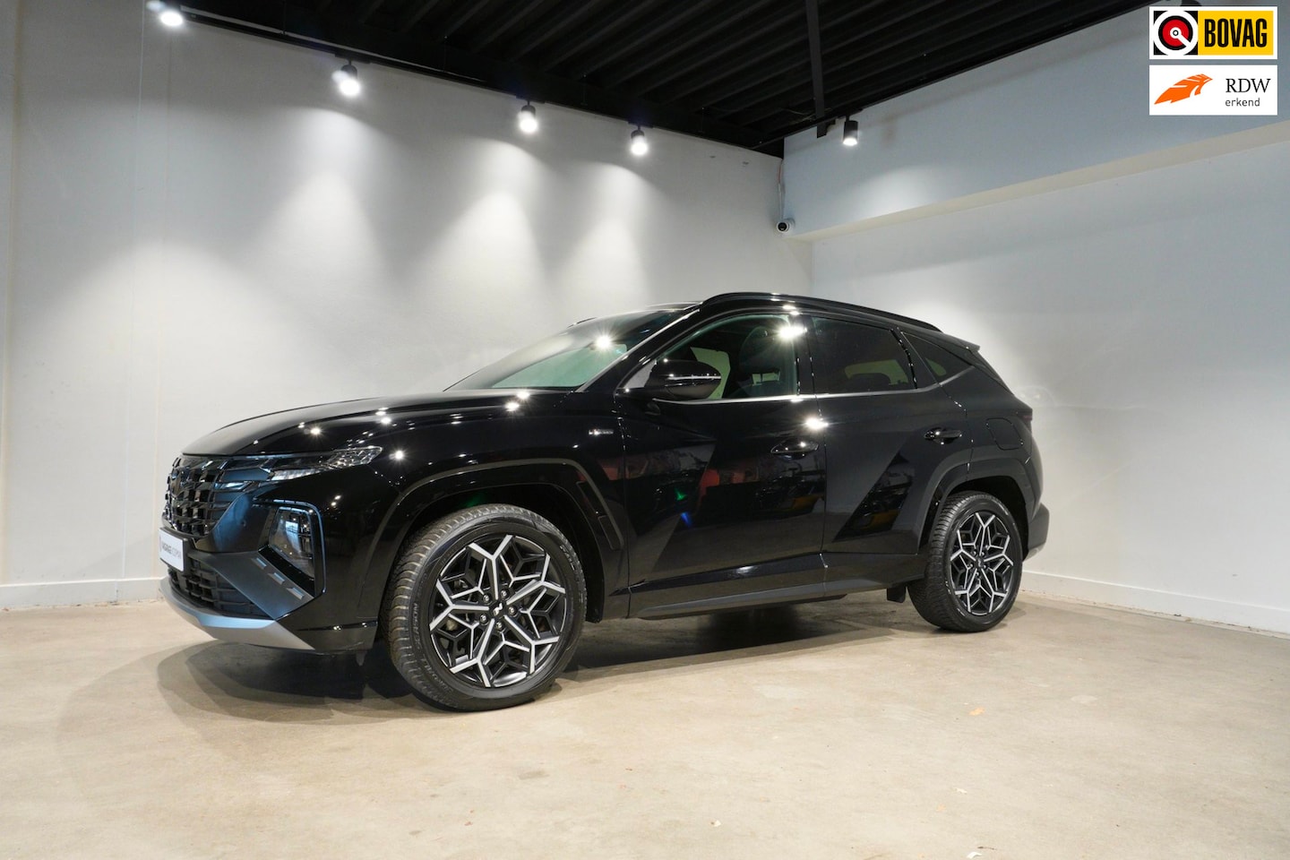 Hyundai Tucson - 1.6 T-GDI PHEV N Line Sky 4WD Pano|Stoelverwarming|adaptief - AutoWereld.nl