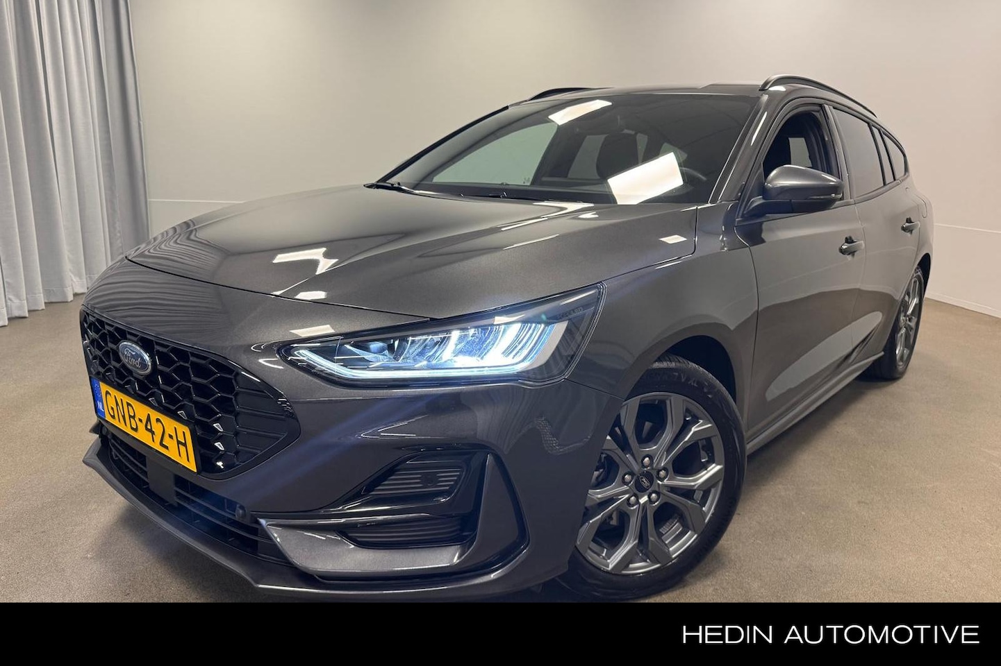 Ford Focus Wagon - 1.0 EcoBoost Hybrid ST Line | Stoel/Stuur/Voorruitverwarming | Navi | Car Play | Pr. Glass - AutoWereld.nl