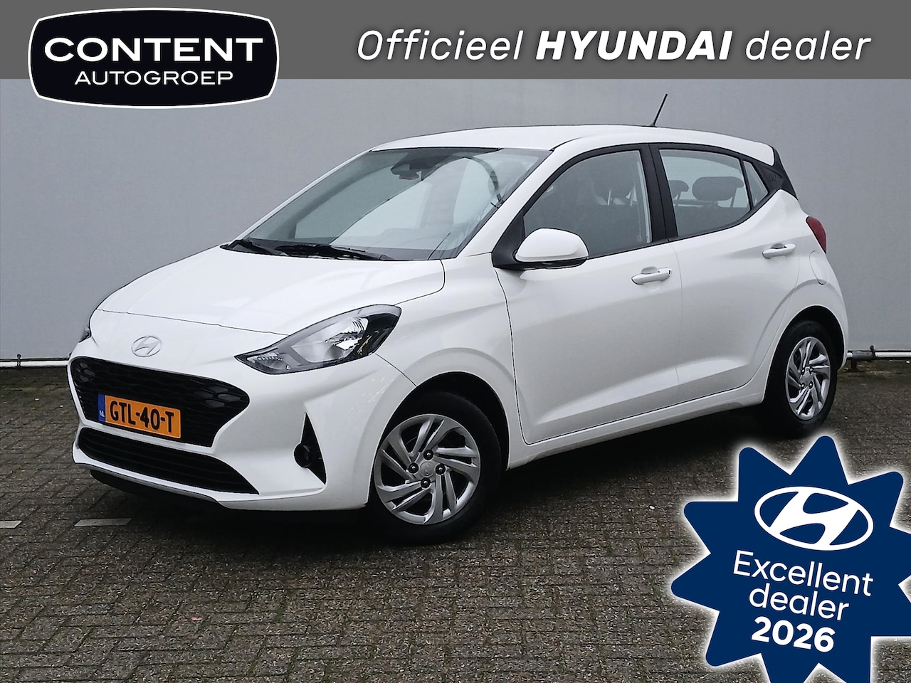 Hyundai i10 - 1.0i 67pk Aut Comfort Smart | Navi | Cruise | all-seasons - AutoWereld.nl