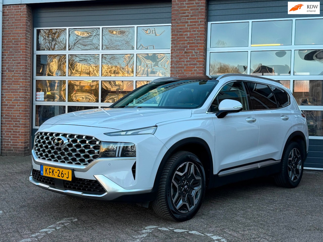 Hyundai Santa Fe - 1.6 T-GDI HEV Premium 7p. leder, 360 camera, HUD, panodak - AutoWereld.nl