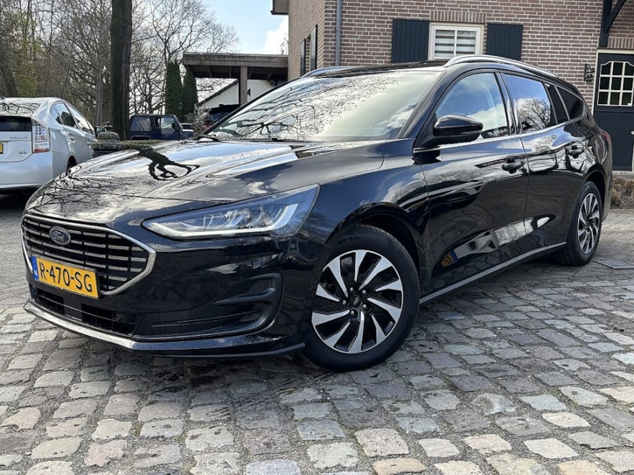 Ford Focus Wagon - 1.0 EcoBoost Hybrid Titanium Style 1.0 EcoBoost Hybrid Titanium Style - AutoWereld.nl