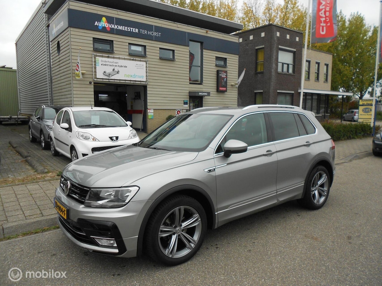 Volkswagen Tiguan - 1.4 TSI Connected Series 1.4 TSI Connected Series, R-Line, Apple Car Play - AutoWereld.nl