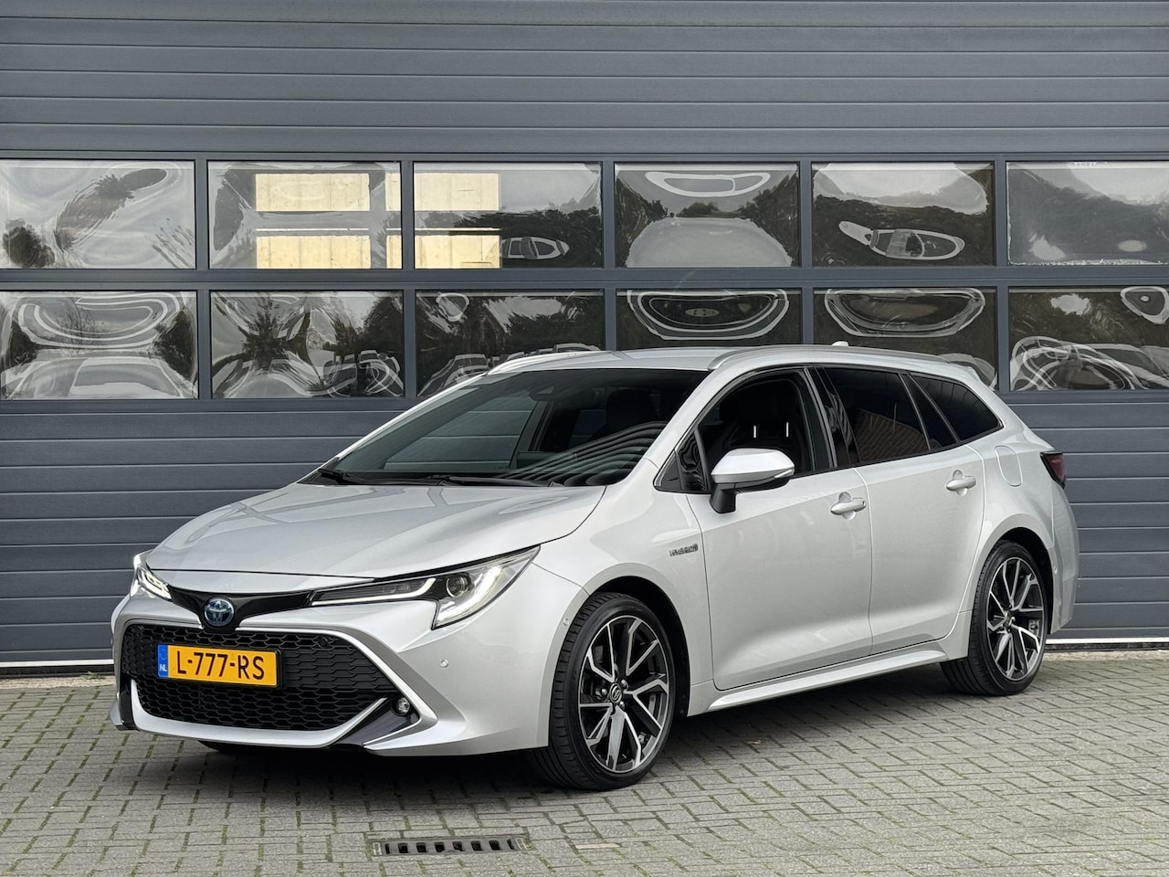 Toyota Corolla Touring Sports - 2.0 HYBRID EXECUTIVE I 2E PAASDAG OPEN I DEALER ONDERHOUDEN I ADAPT. CRUISE CONTROL I APPL - AutoWereld.nl