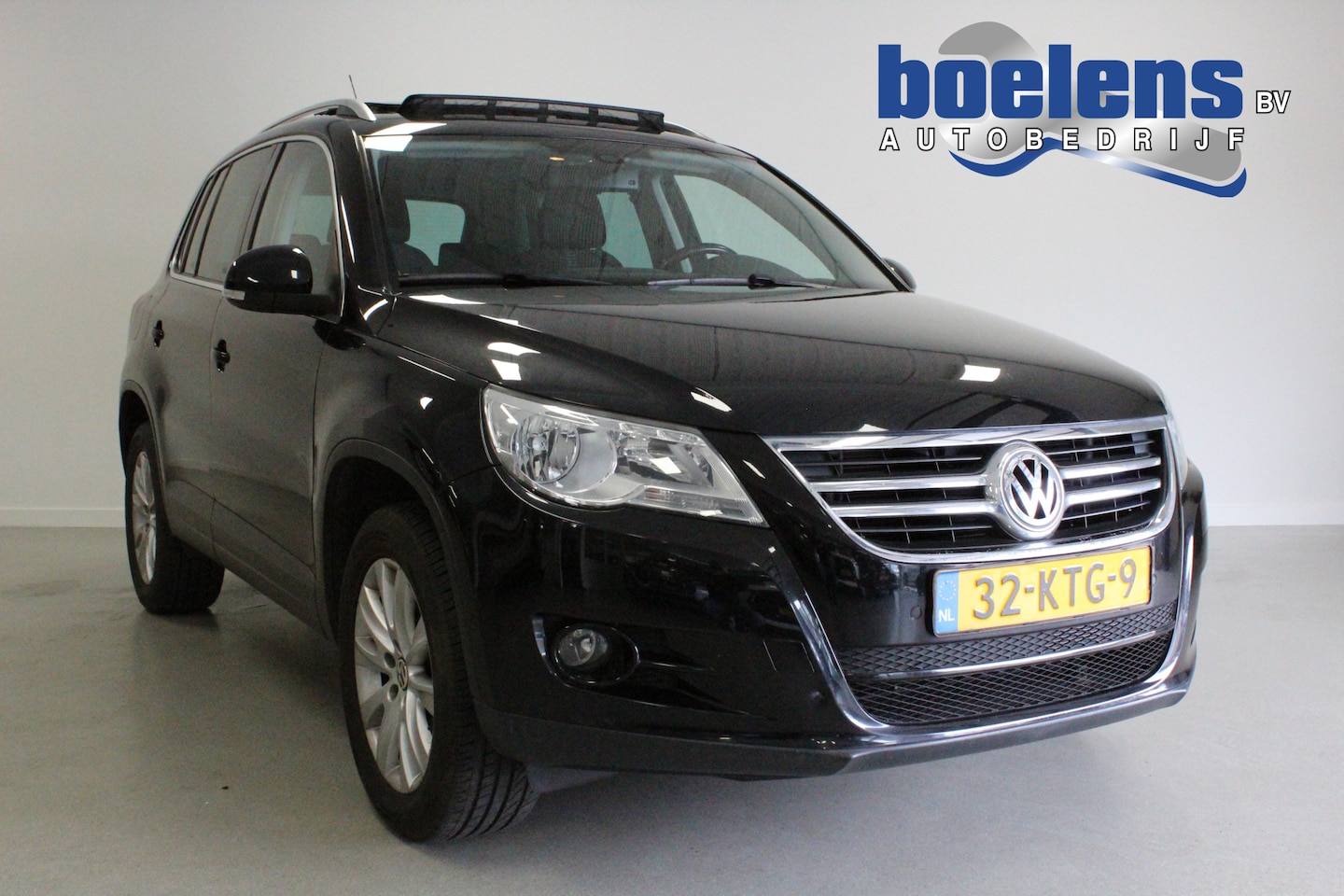 Volkswagen Tiguan - 1.4 TSI Sport&Style | PANO-DAK | CRUISE | PDC-A | NAVIGATIE | CLIMA | TEL | TREKHAAK | 17' - AutoWereld.nl