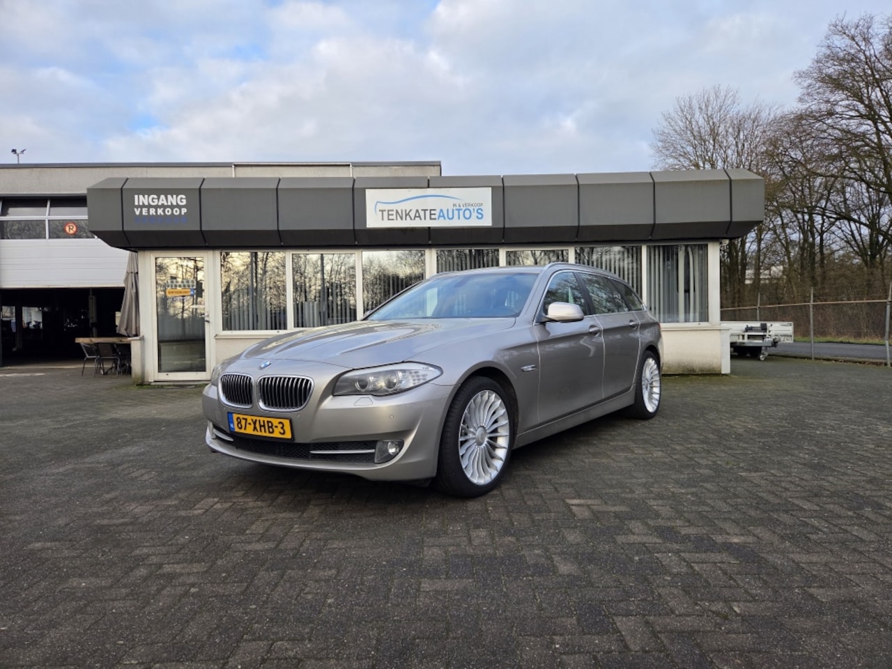 BMW 5-serie Touring - 520i High Executive Leder Automatische airco Cruise control 19 i - AutoWereld.nl