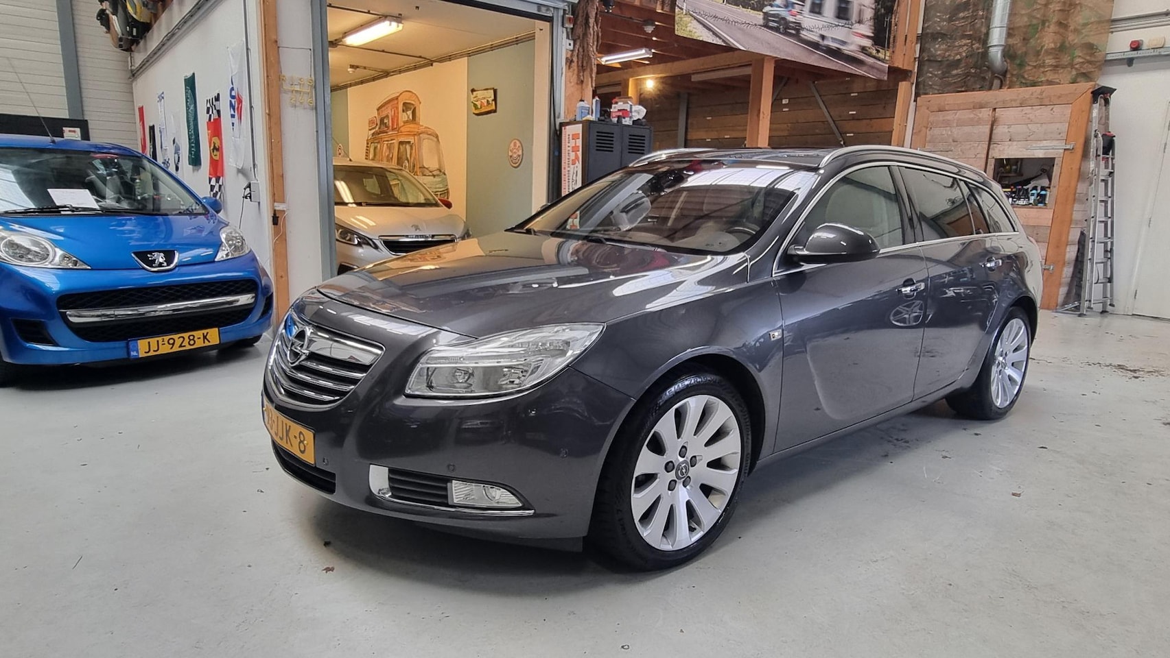 Opel Insignia Sports Tourer - 2.0 T Cosmo 4x4 Leer, Navi, 220 PK, 19" LMV, Panoramadak,... - AutoWereld.nl