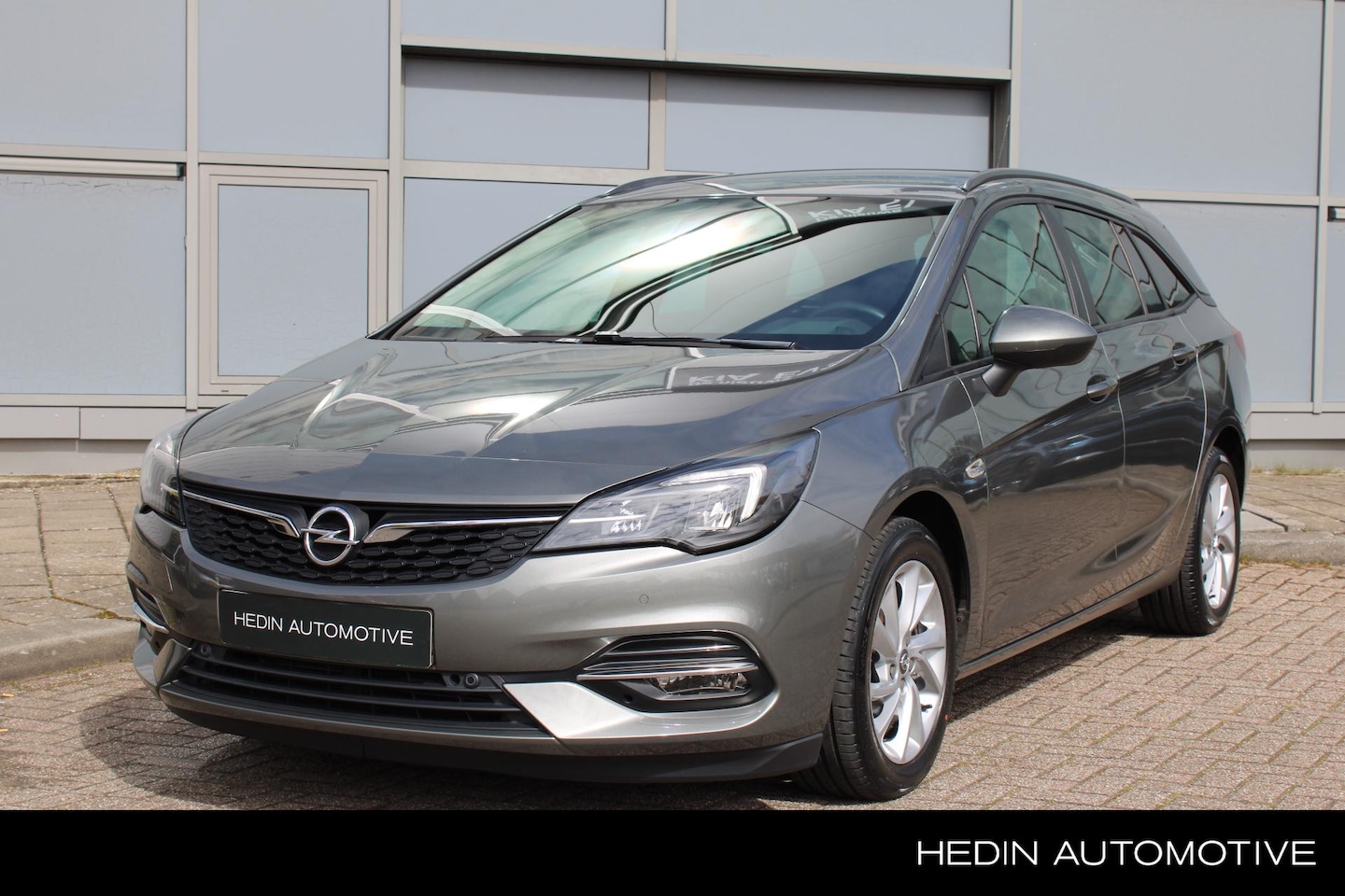 Opel Astra Sports Tourer - 1.2 Business Edition AGR stoelen incl. lederen bekleding - AutoWereld.nl