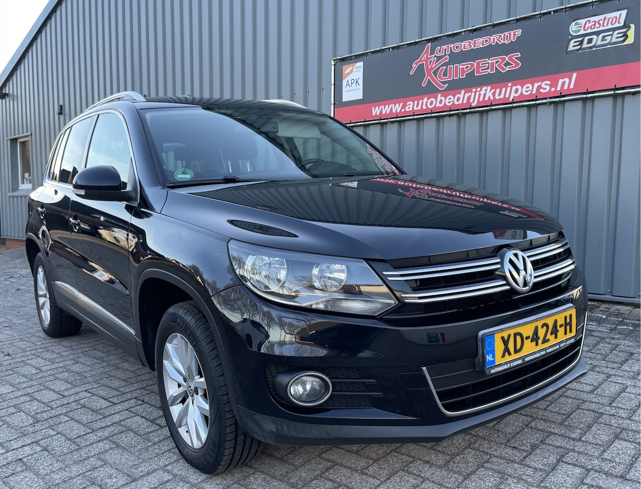 Volkswagen Tiguan - 1.4 TSI Sport&Style Airco.Lm.velgen.Navi.Cruise.Pdc.Trekhaak - AutoWereld.nl
