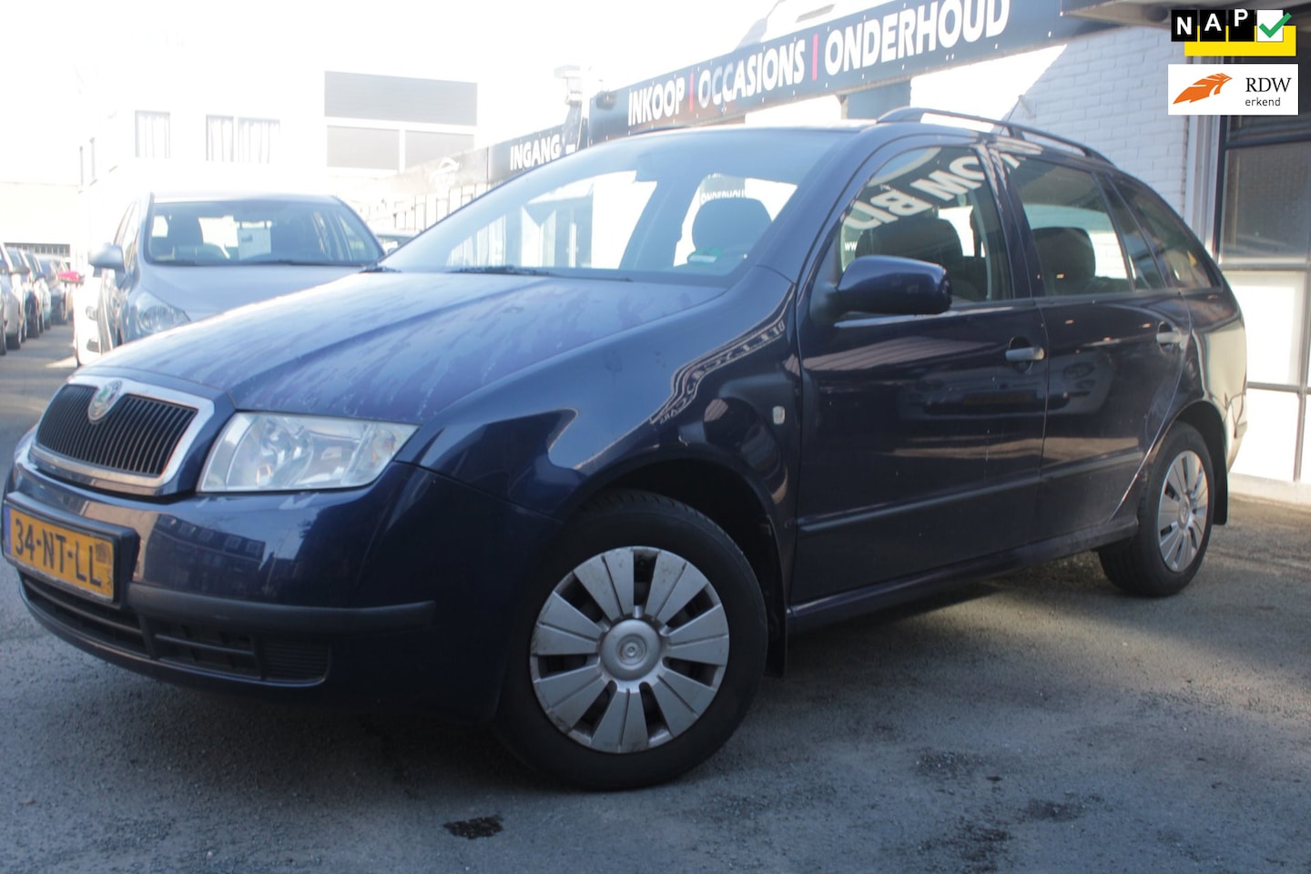 Skoda Fabia Combi - 1.4-16V Choice | Airco | Cruise control | Parkeer sensor | Elec ramen | Trekhaak - AutoWereld.nl