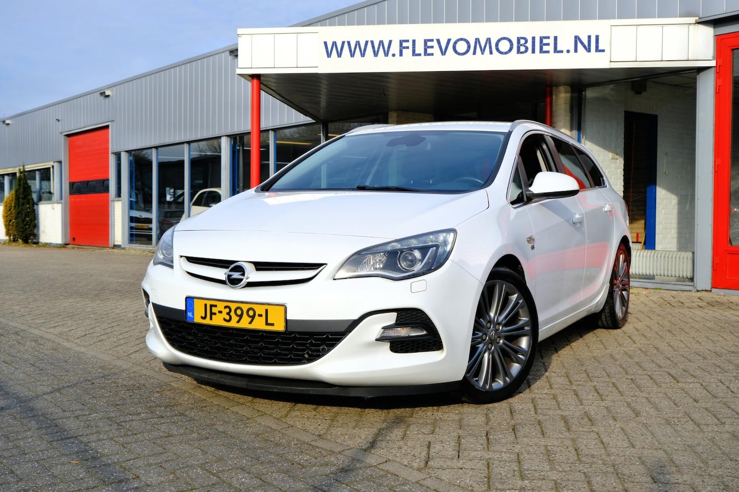 Opel Astra Sports Tourer - 1.4T 140PK OPC Line Sport + Xenon|Leder|Navi|Clima|Cam - AutoWereld.nl