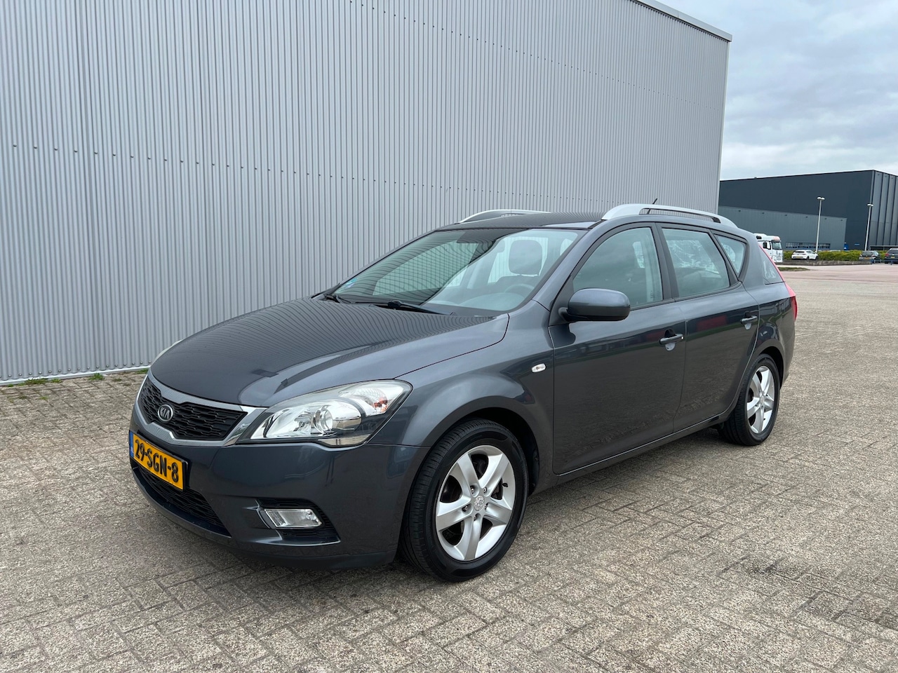 Kia Cee'd Sporty Wagon - 1.4 CVVT Navigator Plus Pack 1 Eigenaar!!! - AutoWereld.nl
