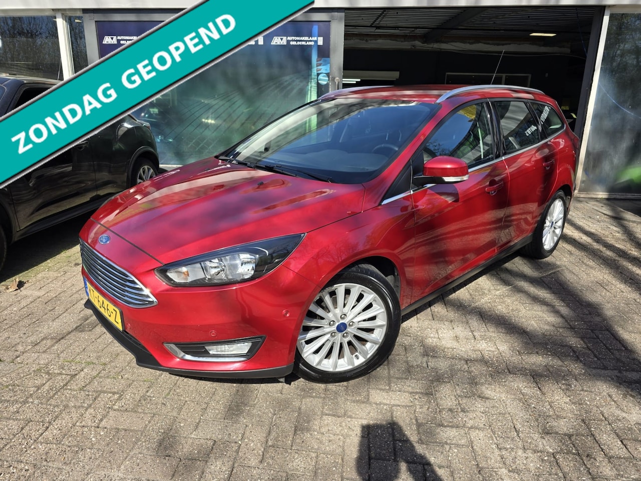 Ford Focus Wagon - 1.0 Titanium | 2E EIGENAAR | 12MND GARANTIE | NAVI | PDC | LMV | TREKHAAK | - AutoWereld.nl