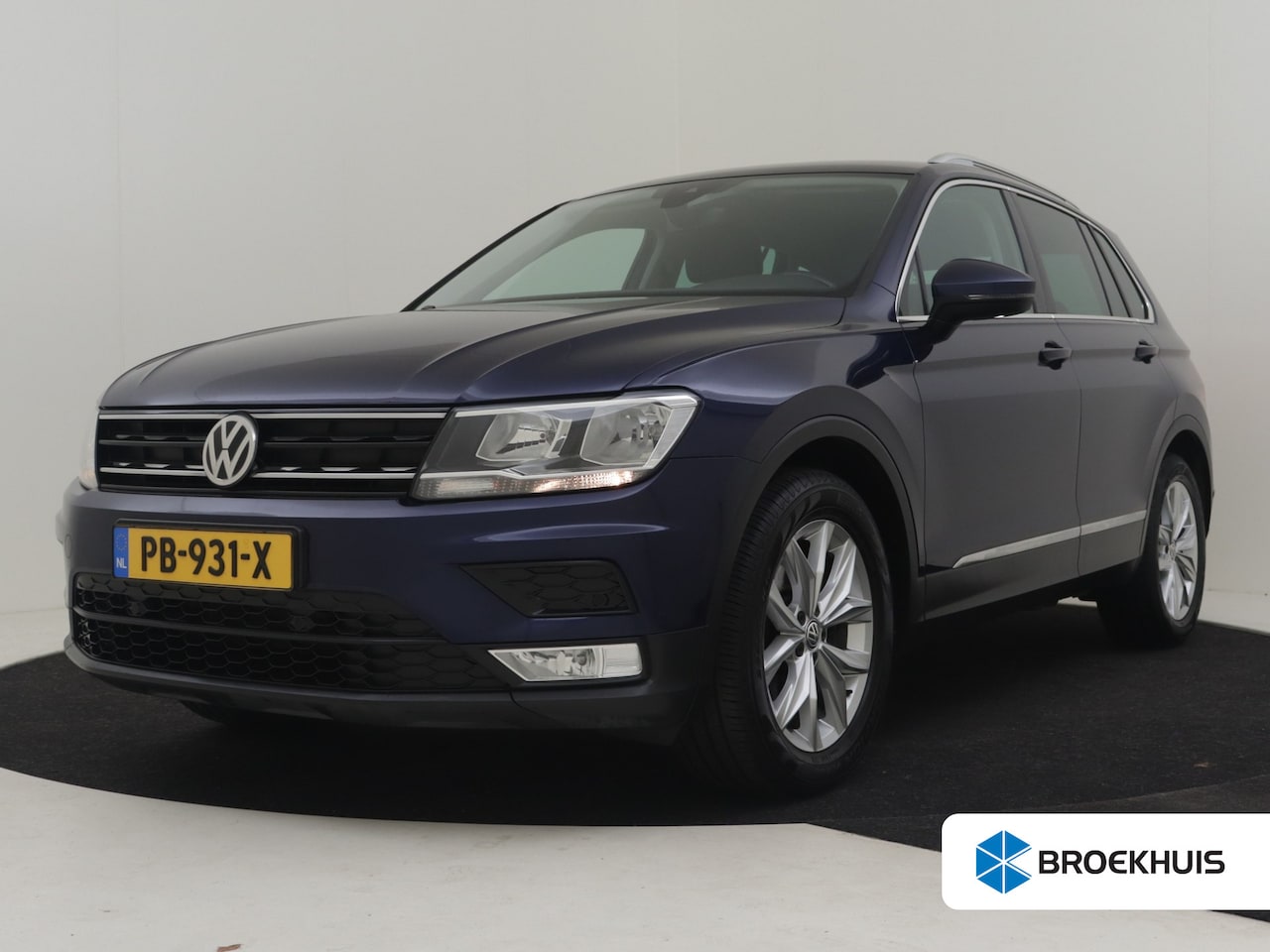 Volkswagen Tiguan - 1.4 TSI ACT Connected Series | Trekhaak | Cruise control | Apple carplay Android auto | Na - AutoWereld.nl
